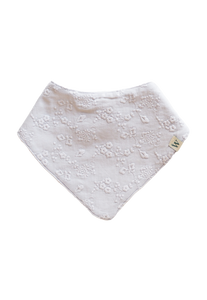 A stunning smokey grey embroidered cotton bib. Highly absorbent for babies and toddlers. Made from 100% organic cotton and bamboo. Adjustable with three nickel free dome closures. Ethically made in New Zealand, by Wilderling